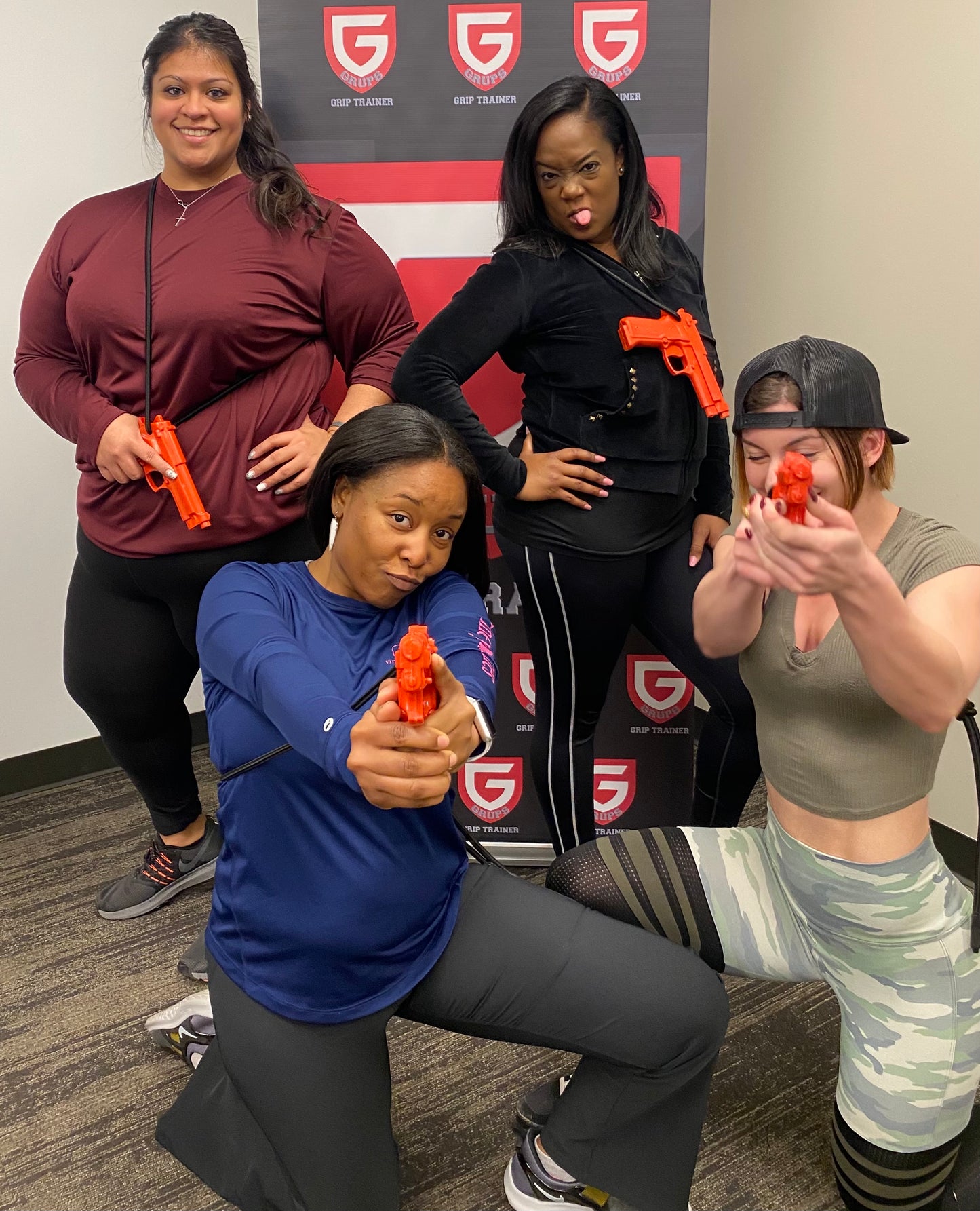 Group of women training with the GRUPS® Grip Trainer during a self-defense class, building grip strength and confidence together.